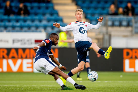 Yacouba Sylla of Strømsgodset and Samuel Fridjonsson of