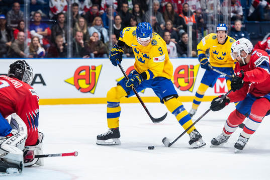 Adrian Kempe of Sweden against goaltender Henrik Haukeland