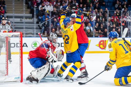 Patric Hörnqvist of Sweden against goaltender Henrik