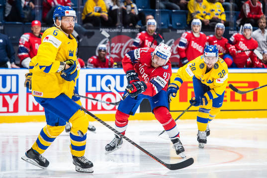 Patrick Thoresen of Norway against Adam Larsson and Elias