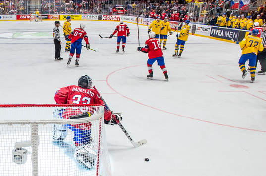 goaltender Henrik Haukeland of Norway looks dejected