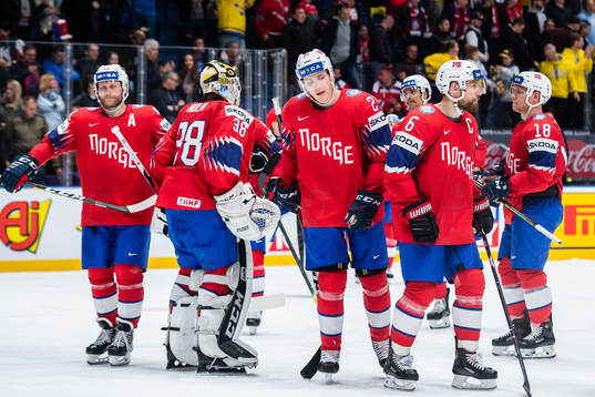 Goaltender Henrik Holm, Christian Bull and Jonas Holøs