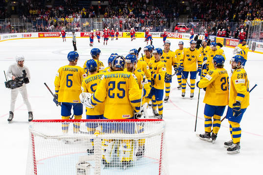 Players of Sweden celebrate