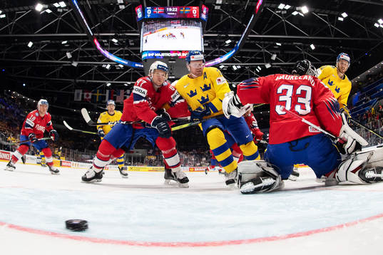 Alexander Wennberg (R) of Sweden scores 0-1 behind