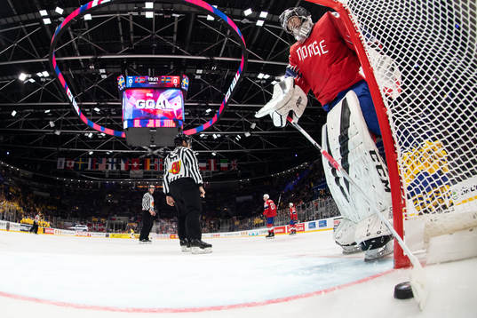 Goaltender Henrik Haukeland of Norway looks dejected