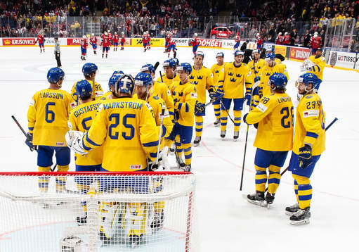 Players of Sweden celebrate their win