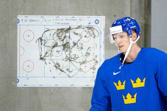 A tactics board in front of John Klingberg of Sweden at a