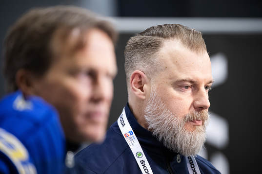 Assistant coach Johan Garpenlöv and head coach Rikard