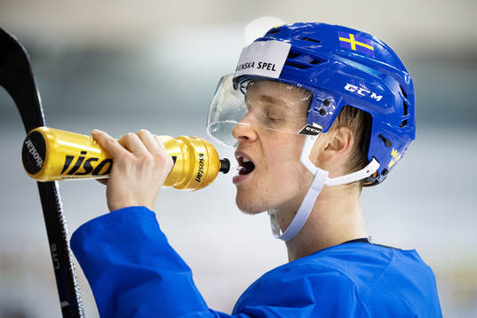 Elias Pettersson of Sweden drinks water at a practice