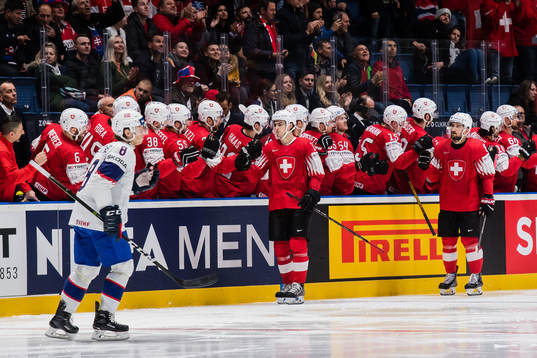 Nico Hischier and Vincent Praplan of Switzerland celebrates