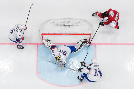 Nico Hischier of Switzerland scores 2-0 behind goaltender