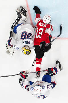 Goaltender Henrik Holm and Christian Bull of Norway in