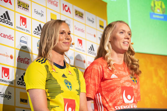 Jonna Andersson and goalkeeper Hedvig Lindahl of Sweden