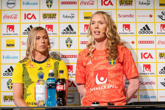 Jonna Andersson and goalkeeper Hedvig Lindahl of Sweden