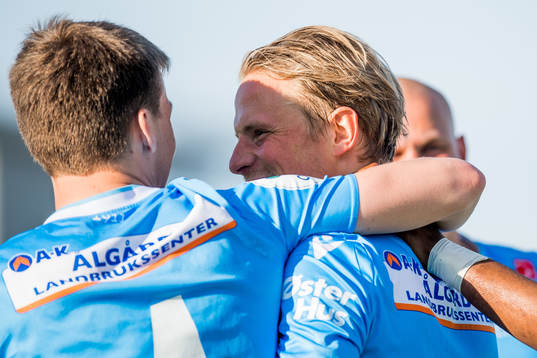 Axel Kryger and Tapio Heikkilä of Sandnes Ulf celebrate
