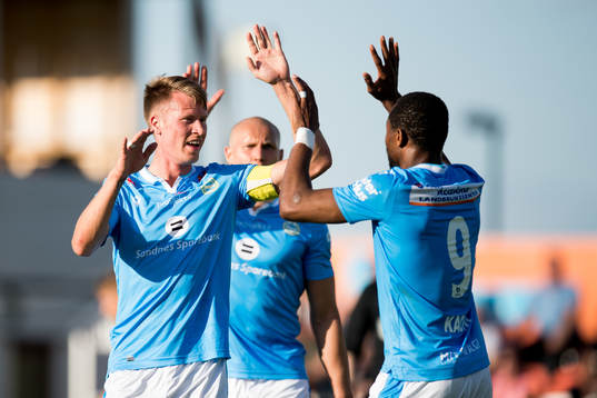Kent Håvard Eriksen and Kachi of Sandnes Ulf celebrate 1-3
