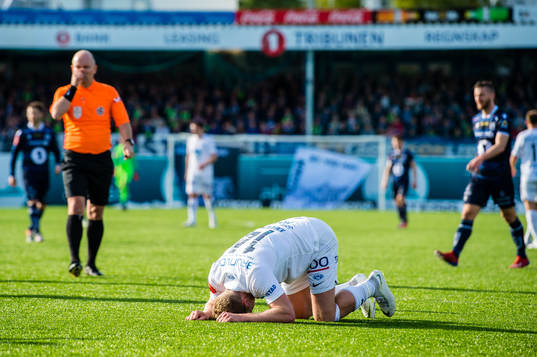 Erling Knudtzon of Molde in pain