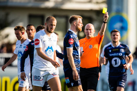 Dan Peter Ulvestad of Kristiansund gets a yellow card by