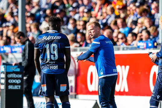 Aliou Coly of Kristiansund and Christian Michelsen, head