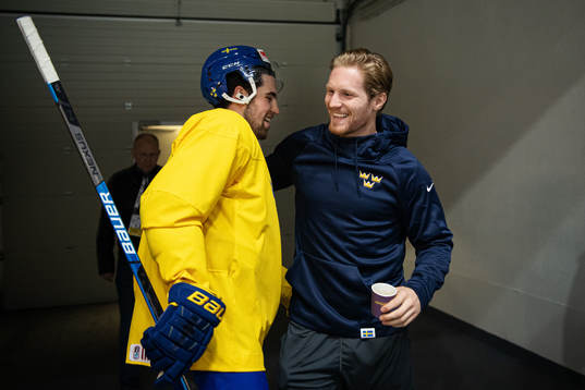 Erik Gustafsson greets Gabriel Landeskog of Sweden at a