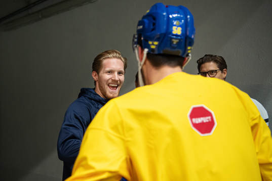 Gabriel Landeskog greets Erik Gustafsson of Sweden at a