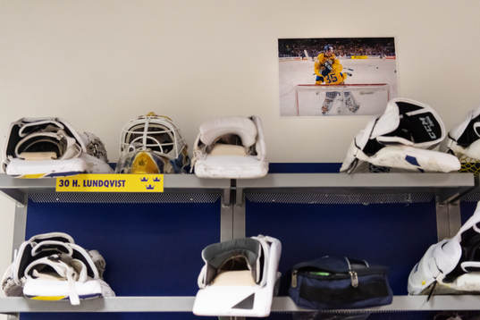 A celebratory photo is seen above the changing area of