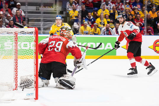 Adrian Kempe of Sweden scores 5-0 behind goaltender