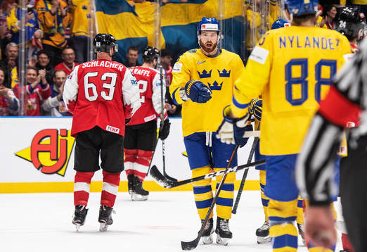 Adam Larsson and William Nylander of Sweden celebrates