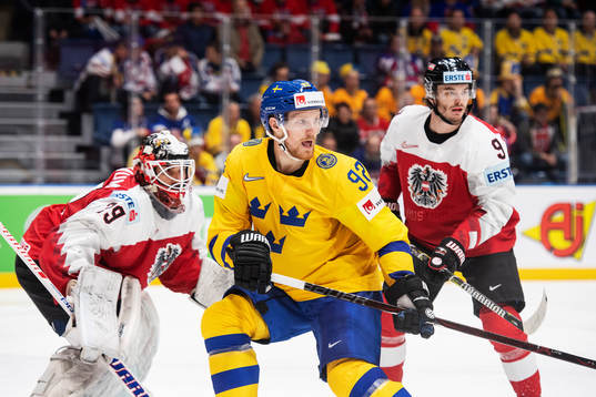 goaltender Bernhard Starkbaum and Alexander Rauchenwald of