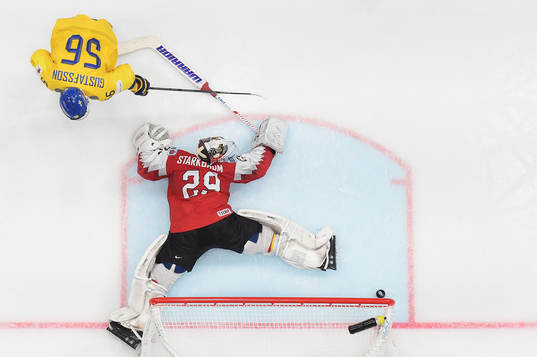 goaltender Bernhard Starkbaum of Austria with a save