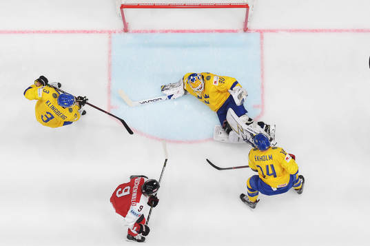 Goaltender Henrik Lundqvist of Sweden with a save