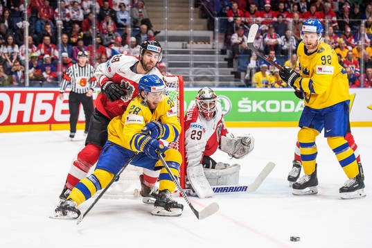 Elias Lindholm and Gabriel Landeskog of Sweden against