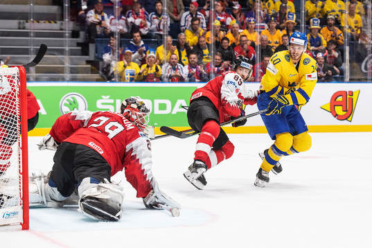 goaltender Bernhard Starkbaum and Raphael Herburger of