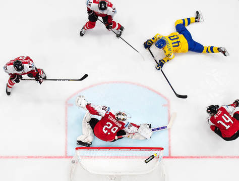 Elias Pettersson of Sweden scores 8-0 behind goaltender