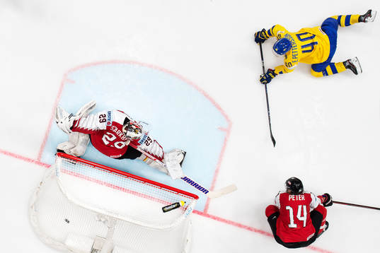 Elias Pettersson of Sweden scores 8-0 behind goaltender