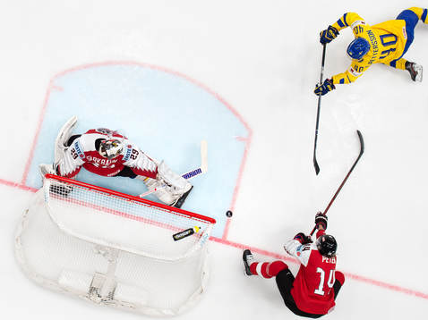 Elias Pettersson of Sweden scores 8-0 behind goaltender