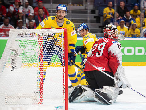 Marcus Krüger of Sweden scores 2-0 behind goaltender