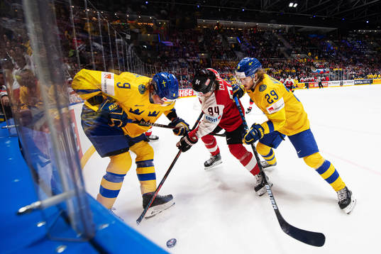 Adrian Kempe and Mario Kempe of Sweden in action against