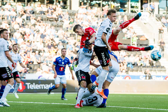 Elbasan Rashani of Odd, goalkeeper Even Barli of Ranheim