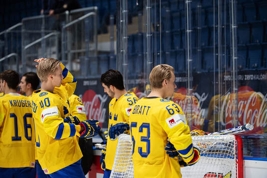Elias Pettersson and Jesper Bratt of Sweden adjusts their
