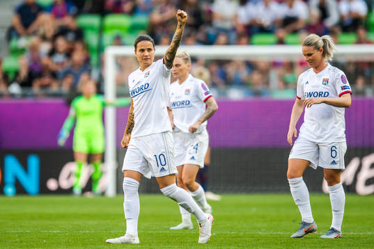 Dzsenifer Marozsán and Amandine Henry of Lyon celebrate