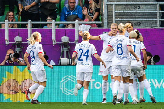 Ada Hegerberg of Lyon celebrate with teammates