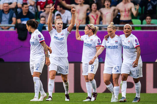 Ada Hegerberg of Lyon celebrate with Dzsenifer Marozsá,