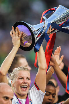 Ada Hegerberg of Lyon lifts the trophy