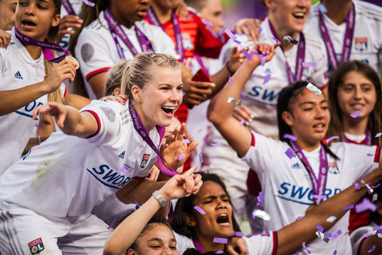 Ada Hegerberg of Lyon celebrate with teammates
