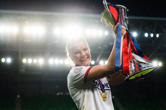 Ada Hegerberg of Lyon poses for a portrait with the trophy