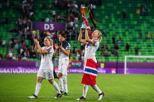 Ada Hegerberg of Lyon lifts the trophy