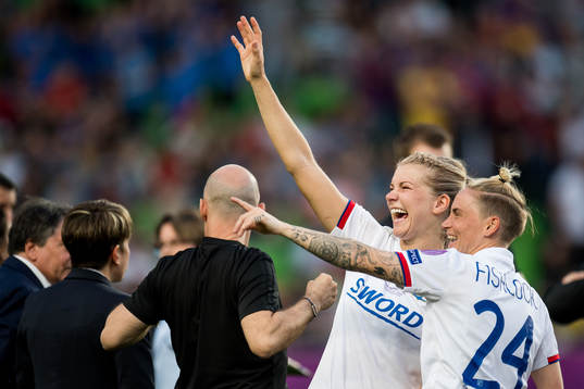 Ada Hegerberg and Jess Fishlock of Lyon celebrate