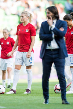 Ada Hegerberg of Lyon and Reynald Pedros, head coach of Lyon