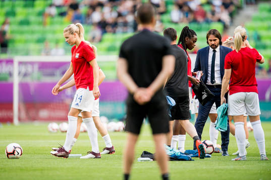 Ada Hegerberg of Lyon and Reynald Pedros, head coach of Lyon